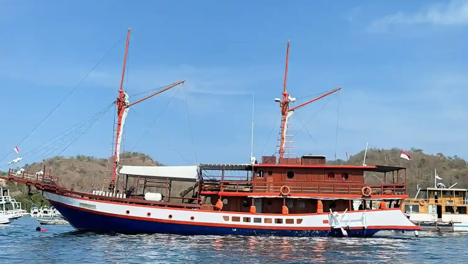 A phinisi under sail in Indonesian waters