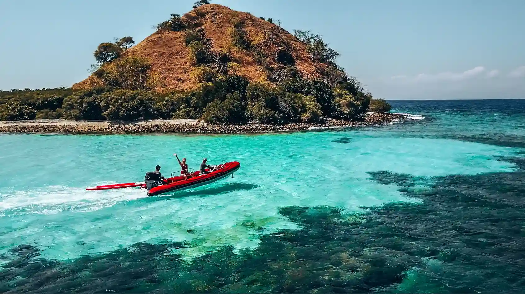 A phinisi under sail in Indonesian waters