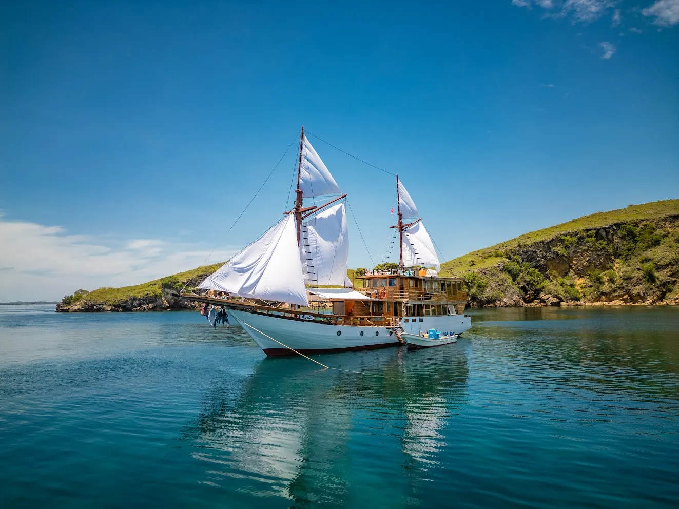 A phinisi under sail in Indonesian waters