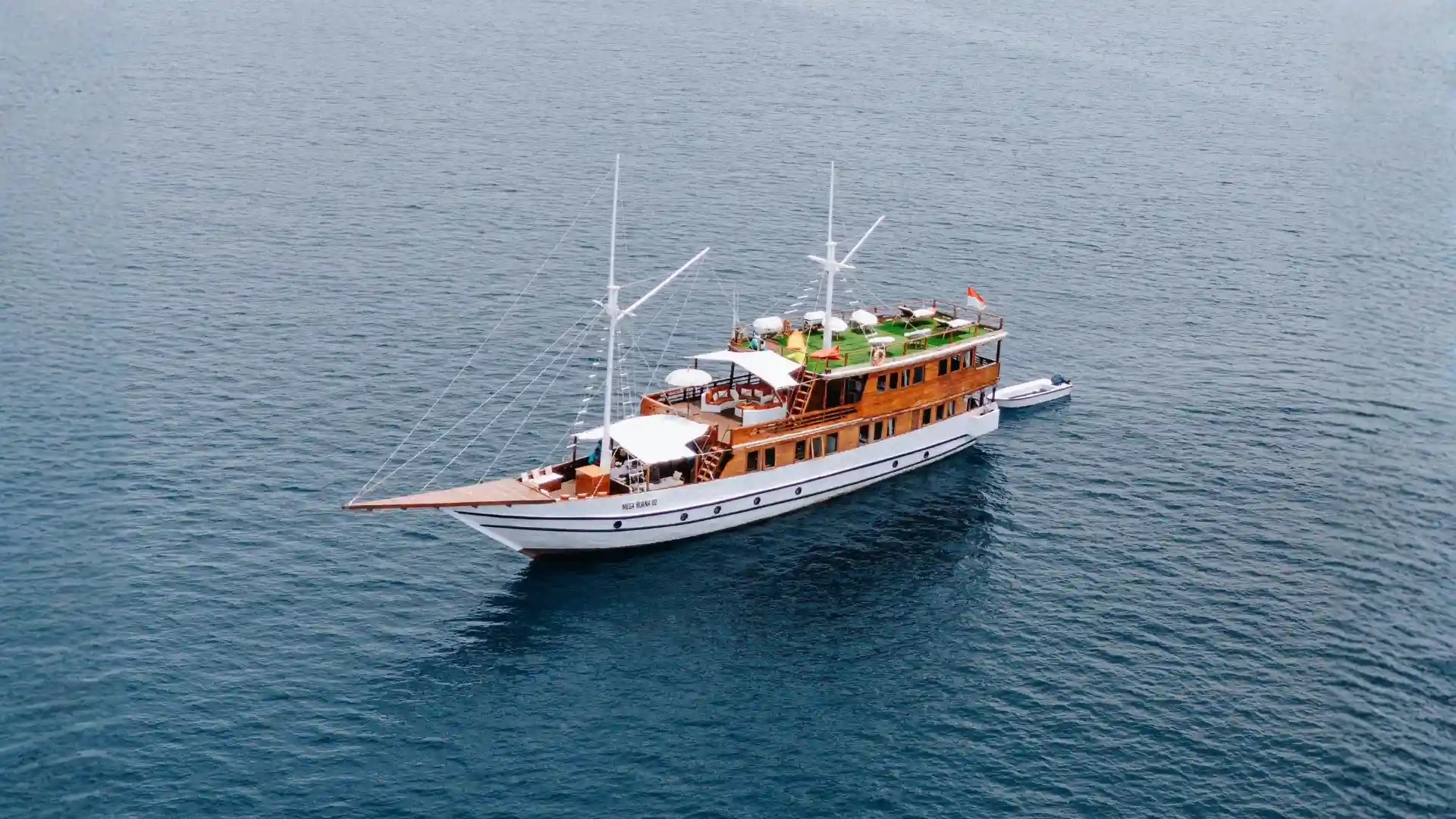A phinisi under sail in Indonesian waters