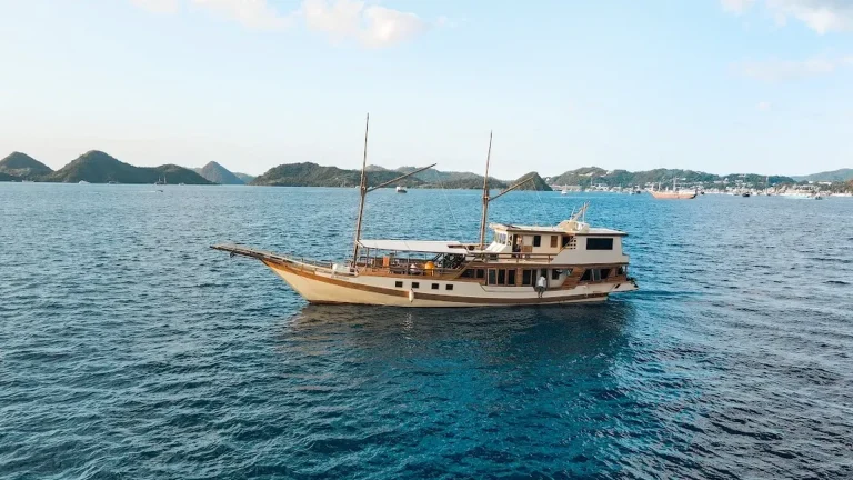 A phinisi under sail in Indonesian waters