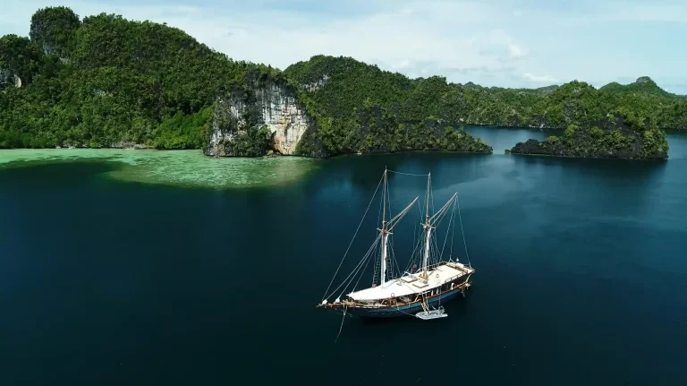 A phinisi under sail in Indonesian waters