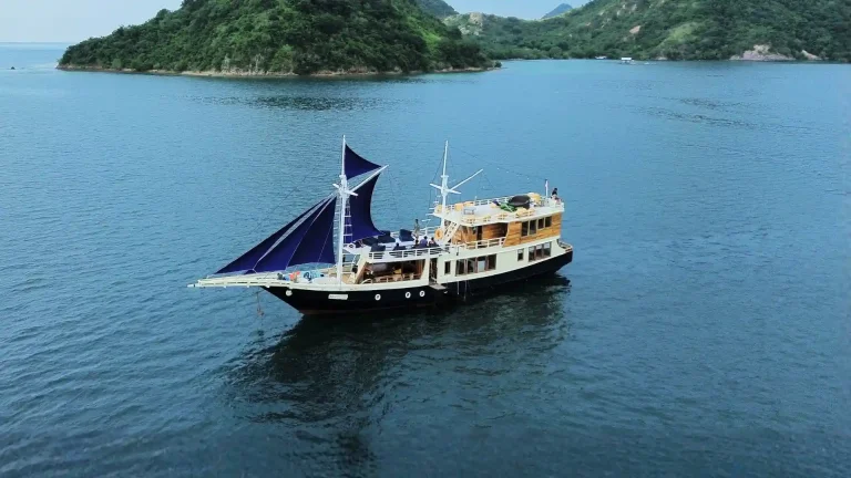 A phinisi under sail in Indonesian waters
