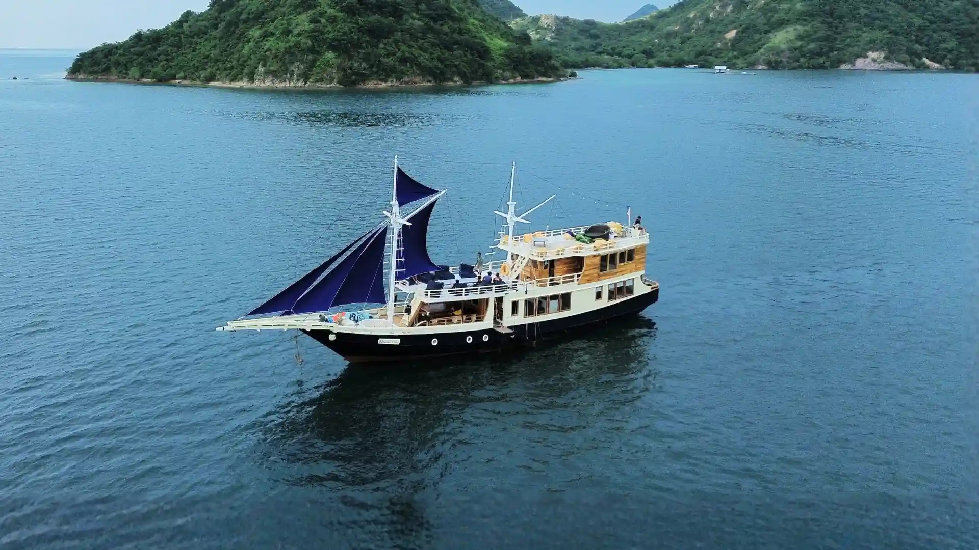 A phinisi under sail in Indonesian waters