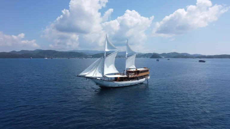 A phinisi under sail in Indonesian waters