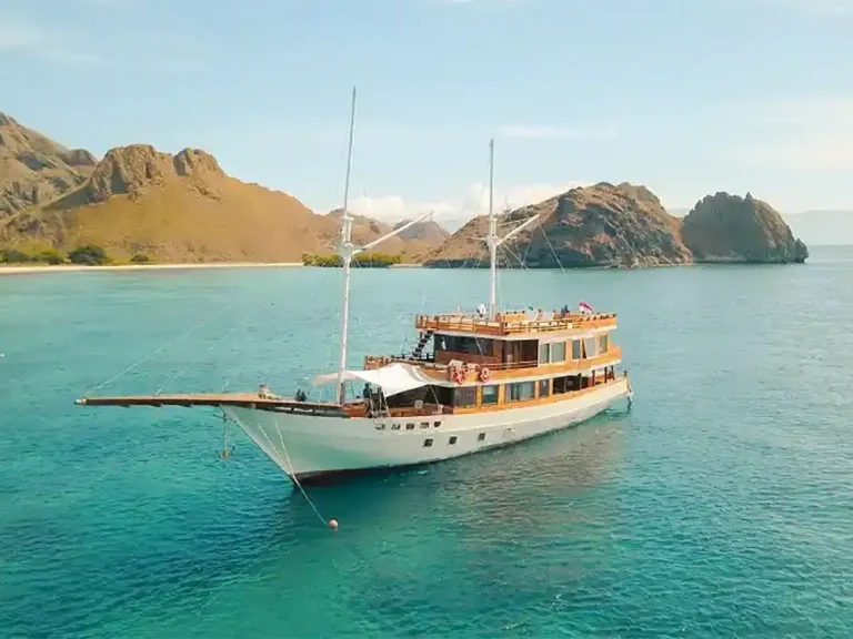 A phinisi under sail in Indonesian waters